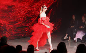 AUCKLAND, NEW ZEALAND - AUGUST 29: A model walks the runway during the Jacqueline Anne show during New Zealand Fashion Week 23: Kahuria at Viaduct Events Centre‎ on August 29, 2023 in Auckland, New Zealand.