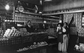 Dullabh and Laxmi Jerambhai with daughter Kamala at their Ponsonby fruit shop.