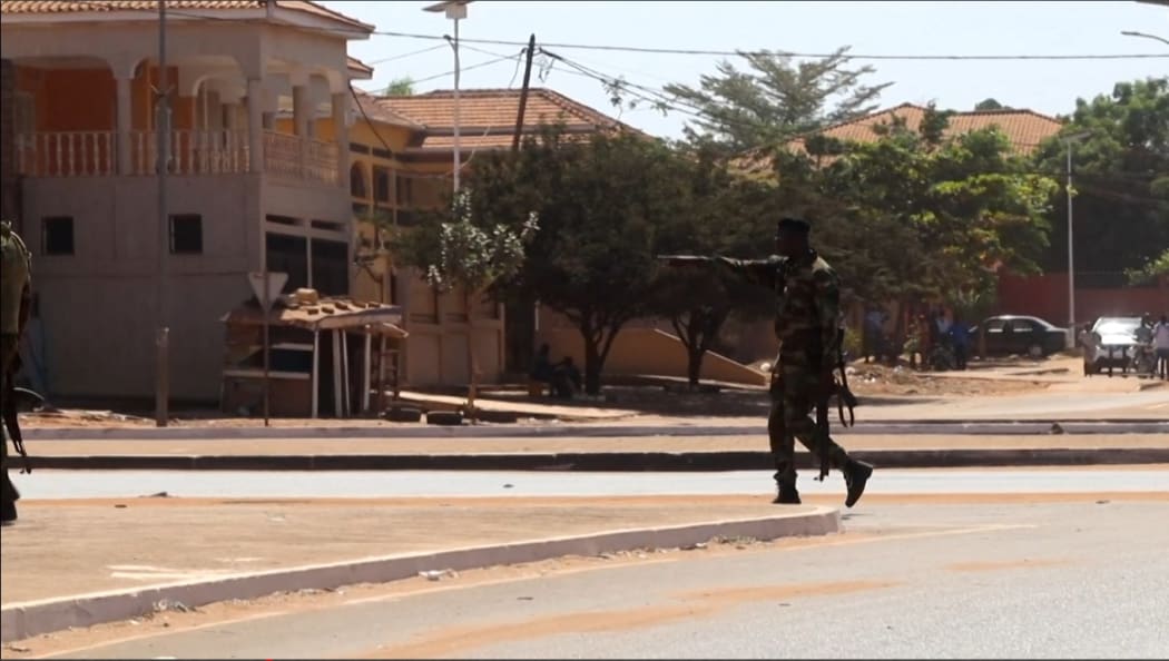 A soldier patrols the government palace area in Bissau, capital of Guinea-Bissau, on February 1, 2022.
