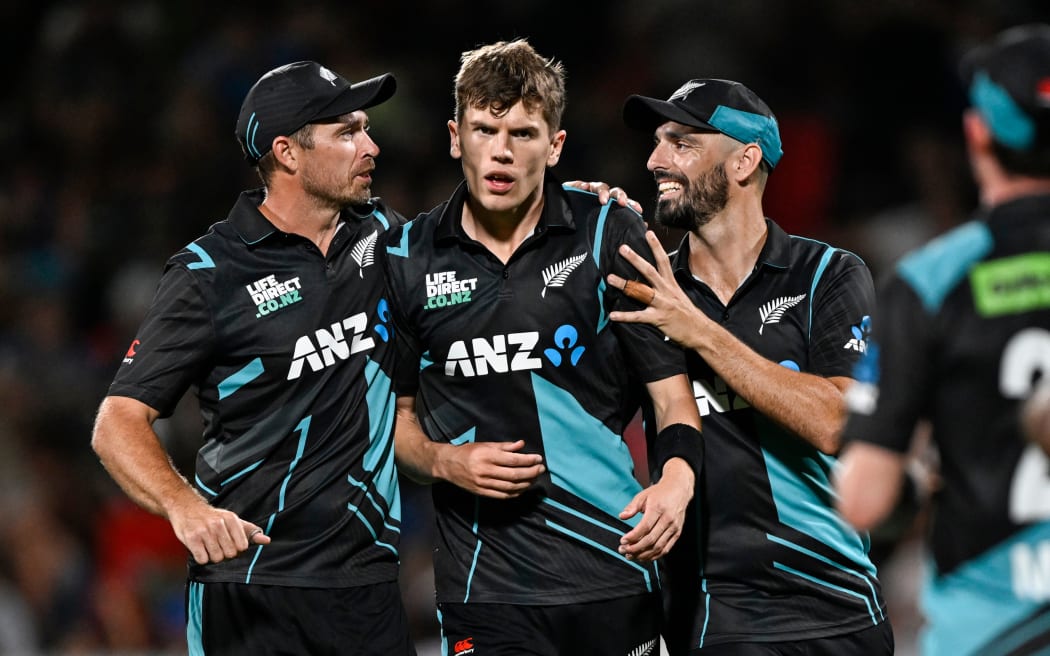 Tim Southee, Ben Sears and Daryl Mitchell celebrate the wicket of Iftikhar Ahmed of Pakistan.