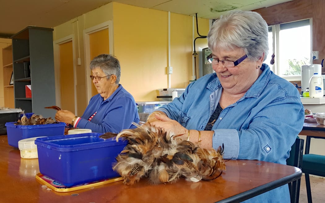 Whāriki o Te Ao students weave in Emily Whyte's garage