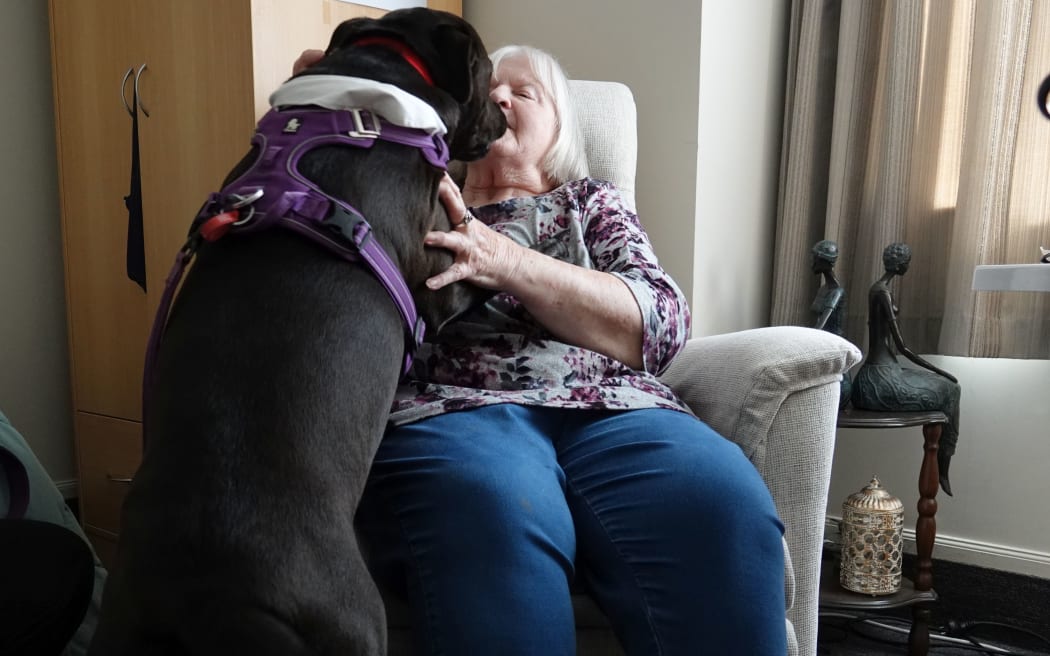 Cleo greets rest home resident Carol Grabrovaz.