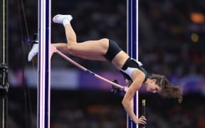 Eliza McCartney competes in the Paris Olympics women's pole vault final.