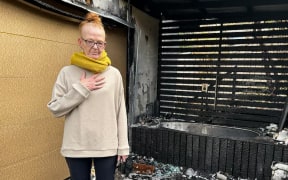 Kate Robinson is warning people about the risks associated with leaving devices on charge. (ABC News: Emile Pavlich)
