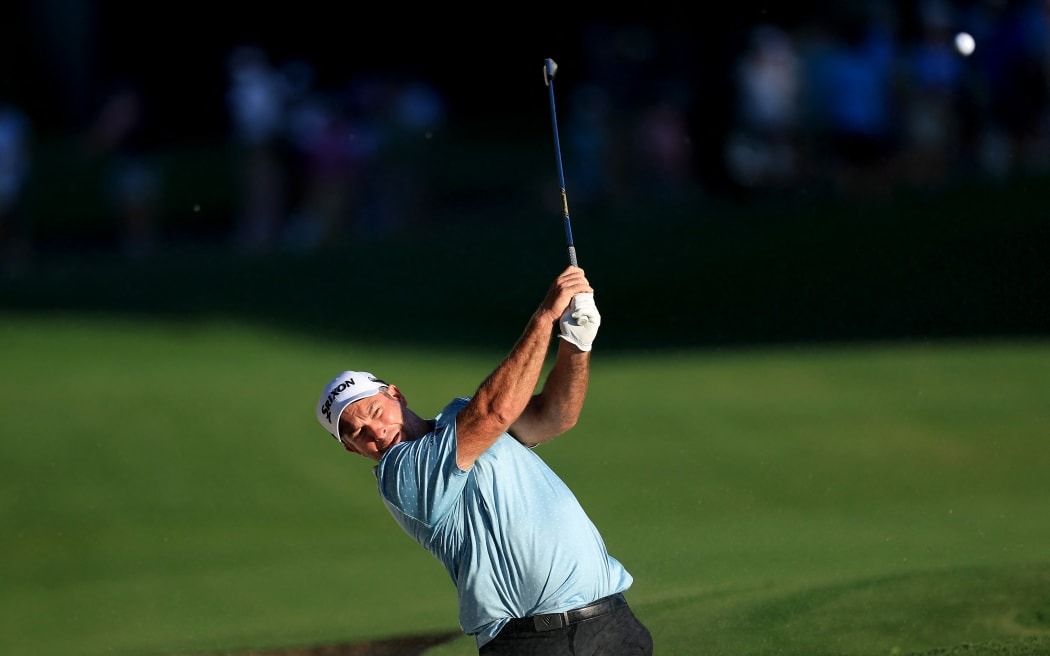 Ryan Fox of New Zealand plays his second shot on the 18th hole during the third round of the PGA Championship at Quail Hollow Country Club in North Carolina., 18 May, 2025.