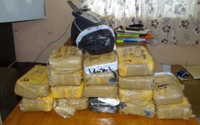This file photo shows a cache of cocaine that washed into Enewetak Atoll in the Marshall Islands in 2016 and was turned over to law enforcement authorities.