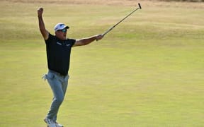 New Zealand's Ryan Fox celebrates holing his birdie putt on the 18th green to win on day four of the 154th Open Golf championship at Royal Birkdale Golf Club near Southport in north-west England on July 19, 2026.