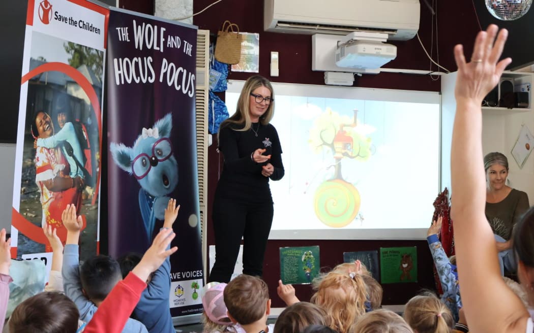 New Zealand author Avril McDonald reading The Wolf and the Hocus Pocus at a Wellington kindergarten.