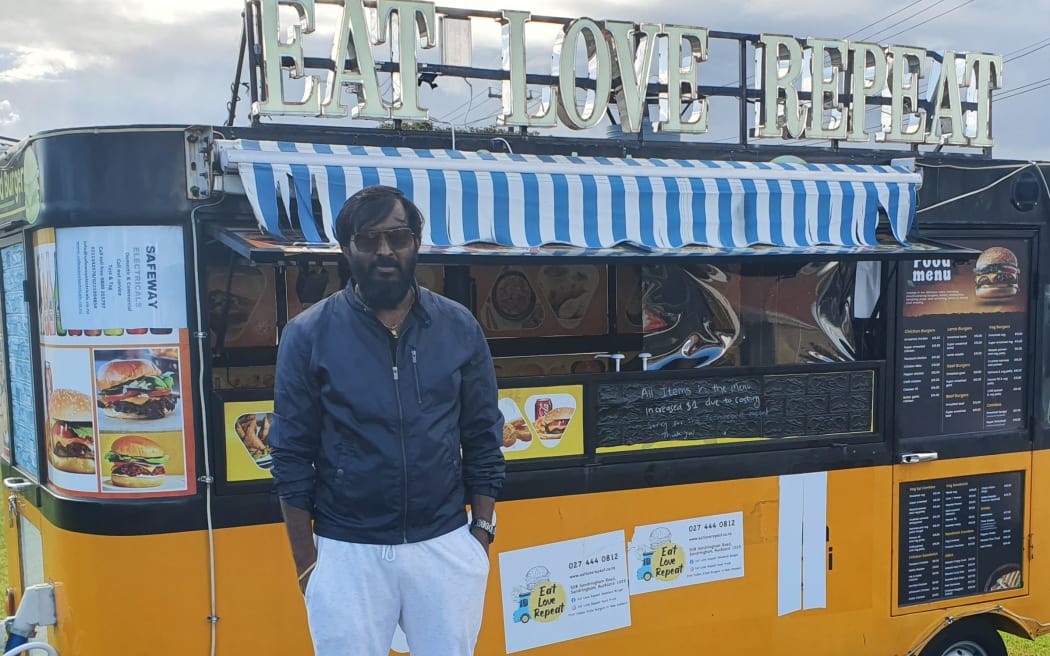 Suresh Mogili in front of his Smashed Burgers food truck in Sandringham, Auckland. SINGLE USE ONLY