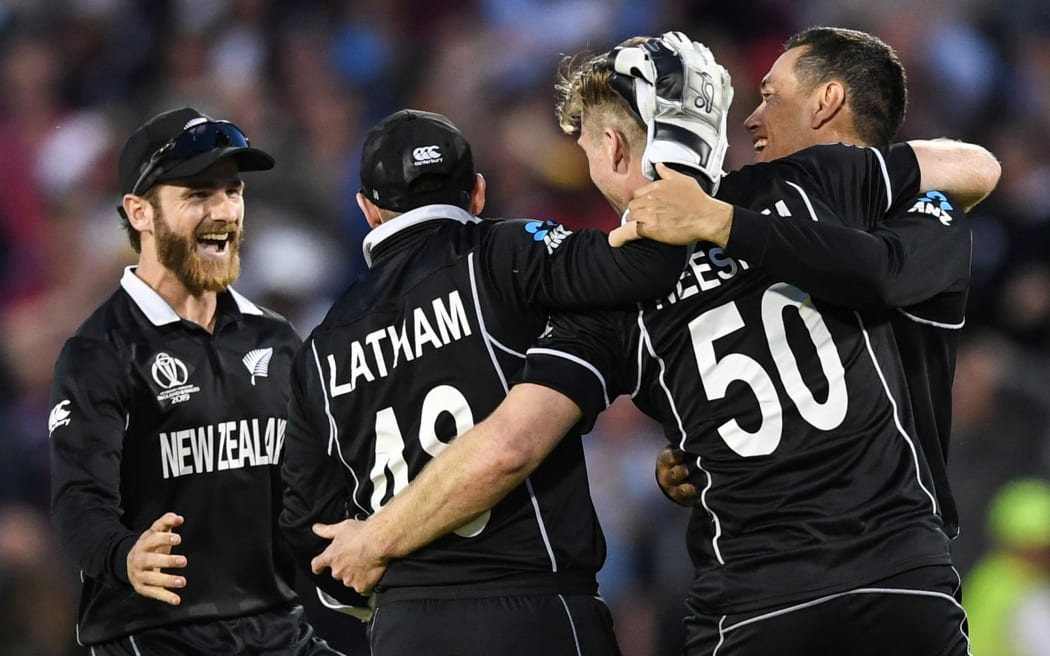 Kane Williamson and the Black Caps celebrate their win over the West Indies.