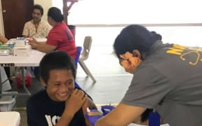 A Covid-19 vaccine being given in June in American Samoa.