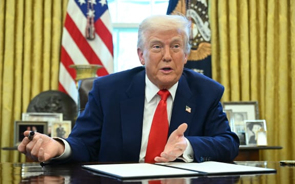 US President Donald Trump speaks before signing an executive order in the Oval Office of the White House on April 9, 2025 in Washington, DC. (Photo by SAUL LOEB / AFP)