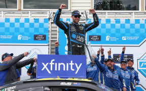 Shane van Gisbergen, driver of the #97 Quad Lock Chevrolet, celebrates in victory lane after winning the Nascar Xfinity Series Pacific Office Automation 147 at Portland International Raceway on June 01, 2024 in Portland, Oregon.
