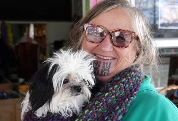 Robyn Mackie, with shihtzu Mickey Baker, says Hikurangi Home Cookery is a key supporter of the local food rescue initiative.
