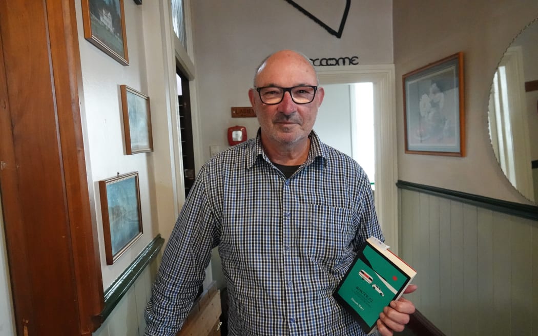 Author Simon Burt recalls the bone-jangling experiences of driving on the road before its upgrade. He's just had published a book about Route 52.