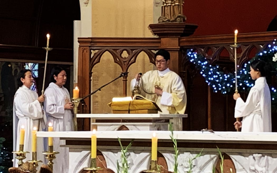 Deacon Thomas Park censes the Gospel