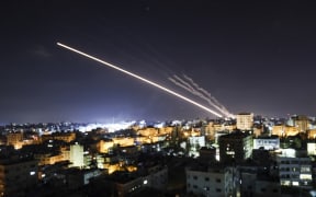 Rockets are launched from Gaza City, controlled by the Palestinian Hamas movement, towards Israel early on May 15, 2021.