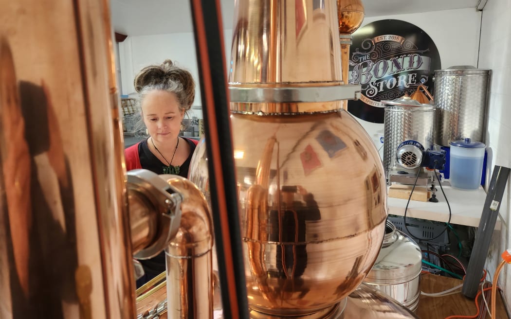 Bec Kay at her gin still