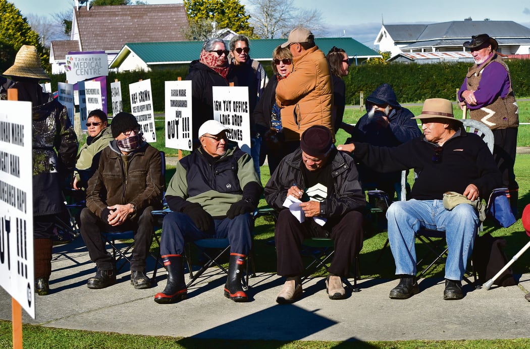 Tuhoe kaumatua relax on chairs during a protest against the iwi’s leadership entity on Monday