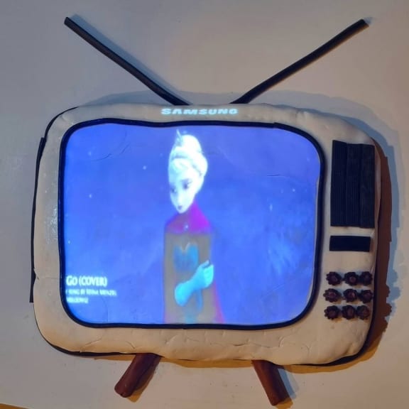 Frozen was one of the films projected onto the TV cake