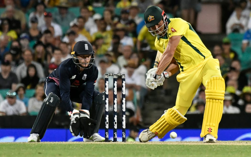 Marcus Stoinis of Australia  goes on the attack against England.