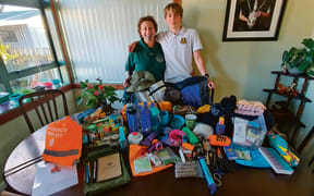 Mawera Karetai and her son Jack Karetai-Barrett have everything they need to survive a natural disaster stored in backpacks at both entrances to their home and in their car.