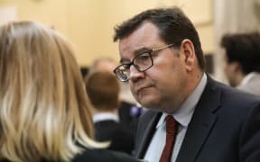 Labour MP Grant Robertson, Minister of Finance listens to media questions