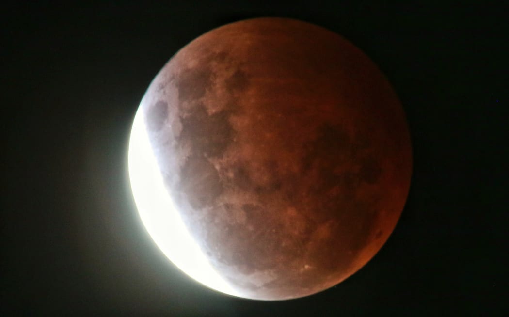 The blood moon almost eclipsed on Wednesday evening. Alistair Bain took supplied this image, taken at Orewa, north Auckland.