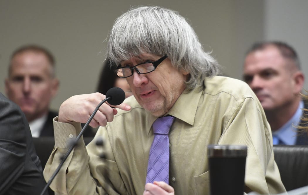 David Turpin becomes emotional as he reads a statement during a sentencing hearing Friday, April 19, 2019, in Riverside, Calif.