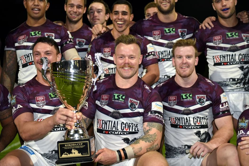 The Burleigh Bears celebrate retaining the Kokoda Cup against the PNG Hunters.