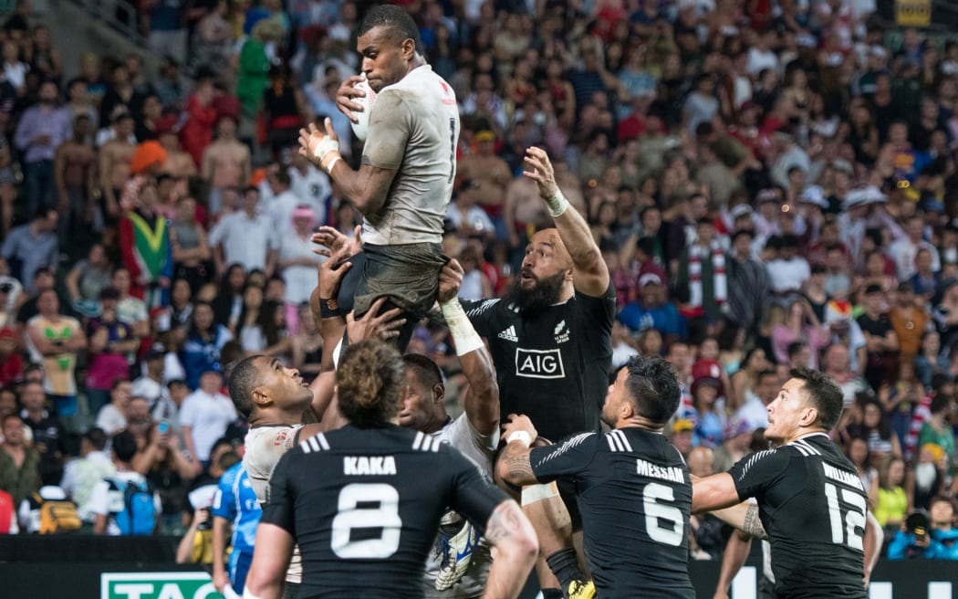 Apisai Domolailai jumps for the ball against New Zealand.