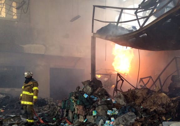 The scene inside the warehouse after the explosion.