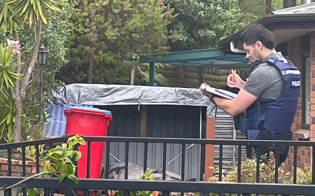 Armed police at the scene of a reported Homicide in Akatarawa Road in Upper Hutt on 22 September 2023.