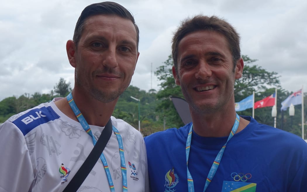 Fiji football coach Christophe Gamel, (left), and Solomons coach Felipe Vega-Arango