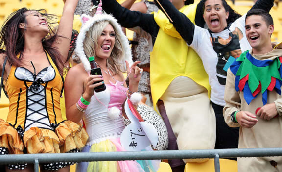 Sevens fans partied despite wet and windy weather.