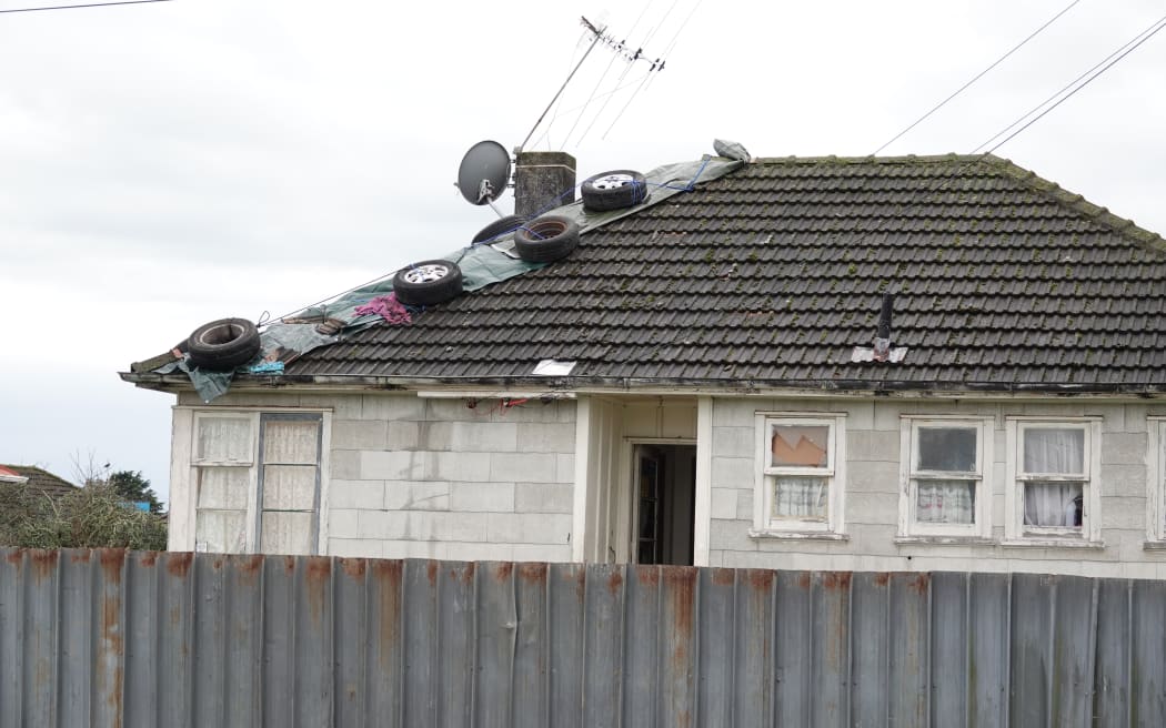 Many houses are still showing the effects of the tornado a fortnight ago.