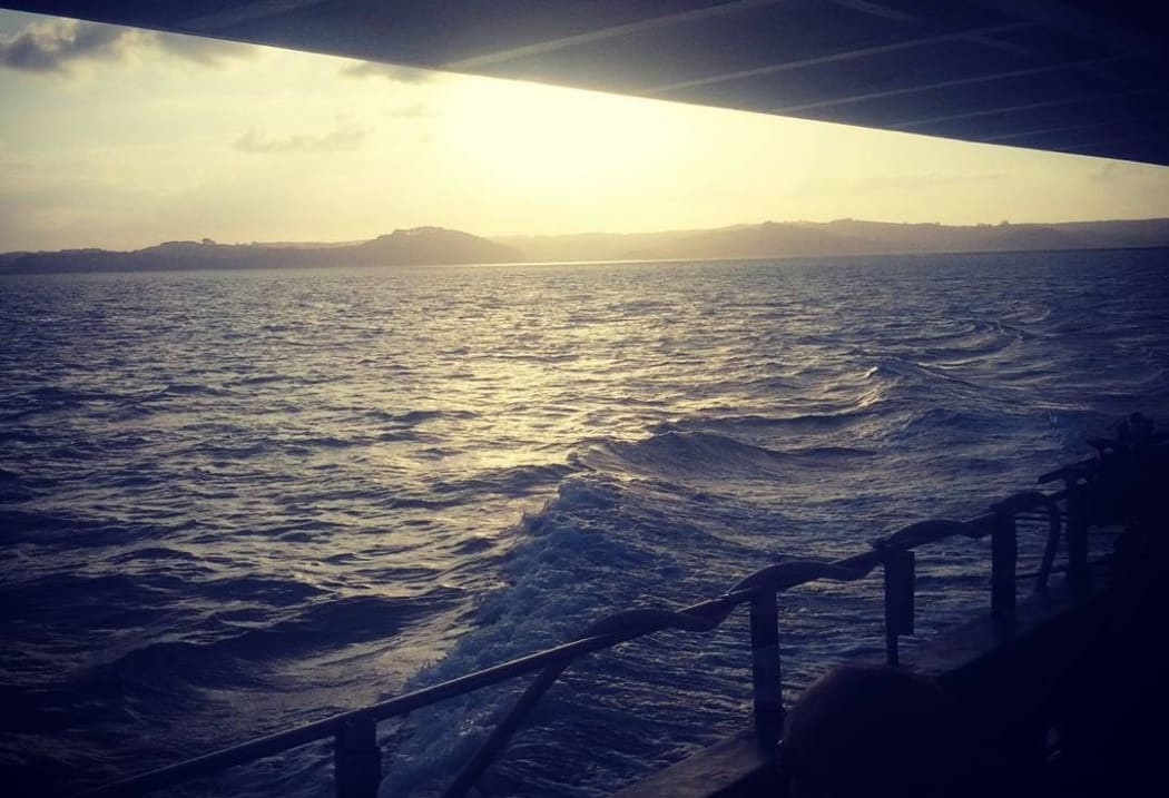 Kaipara Harbour ferry crossing. Taken by Michael Dann during Tour Aotearoa, a bike tour that travels the full length of New Zealand.