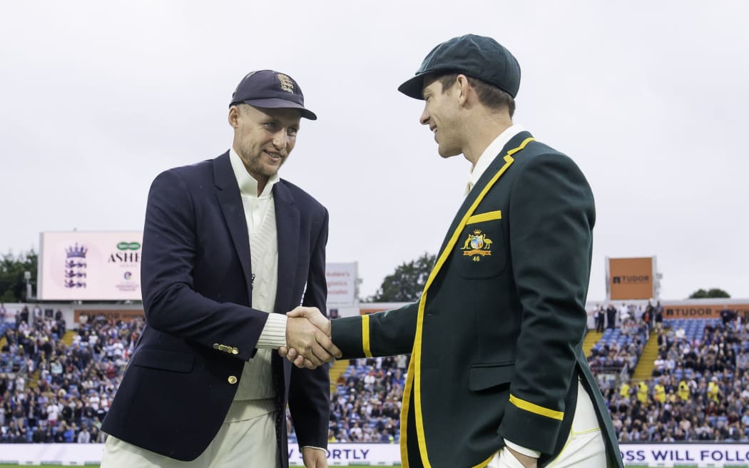 England captain Joe Root shakes hands with Australian captain Tim Paine after winning the coin toss and electing to bowl first. Headingly 2019.