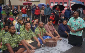 Pacific island climate change campaigners  hold a traditional Fijian sevusevu and offer tapa to a community impacted by a massive coal mine in Germany.