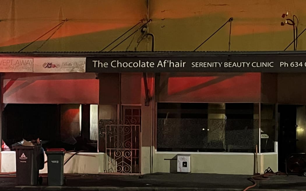 Smoke and a red glow was seen rising over Onehunga after a commercial building caught fire on 26 May, 2024.