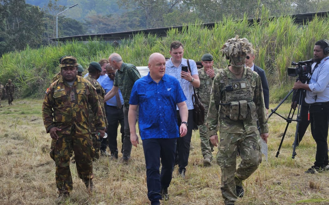NZ PM Christopher Luxon views a mortar training and live firing exercise with NZDF and Papua New Guinea troops.