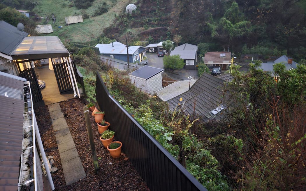 Two Lyttelton properties remain evacuated following a slip on Ticehurst Road.