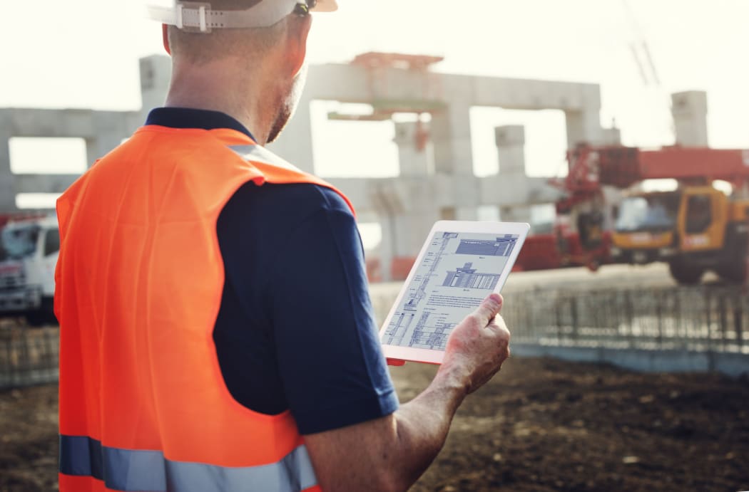 61640355 - construction worker planning contractor developer concept