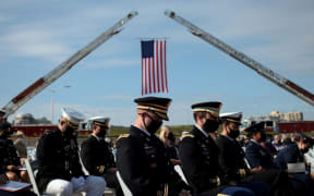 ARLINGTON, VIRGINIA - SEPTEMBER 11: U.S. service members attend the Pentagon 9/11 observance ceremony at the National 9/11 Pentagon Memorial on September 11, 2021 in Arlington, Virginia.