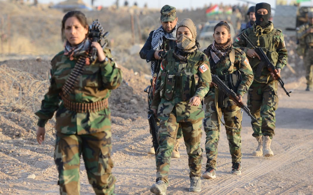 Peshmerga forces move forward as they attack Daesh targets to rescue Naveran village and villages around Mosul.