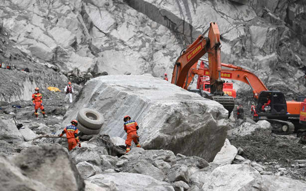 Rescue personnel search through the debris left by a mudslide in the area around the destroyed Gyirong Port in Gyirong County, in China’s western Tibet region on September 2, 2026. (Photo by CNS / AFP) / China OUT