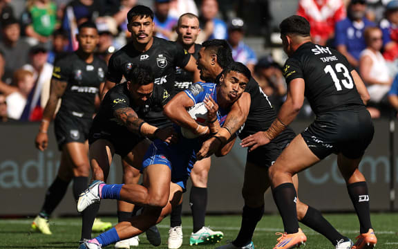 Deine Mariner of Samoa is tackled during the Men's Pacific Championships Final match between New Zealand Kiwis and Toa Samoa.