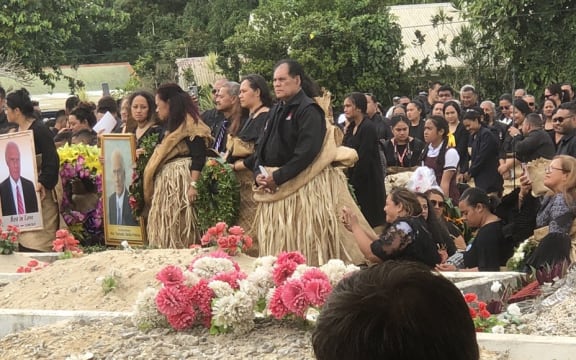 Mourners gather at the gravesite of 'Akilisi Pohiva