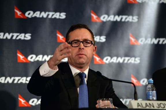 Alan Joyce announcing the cuts at a news conference in Sydney on Thursday.