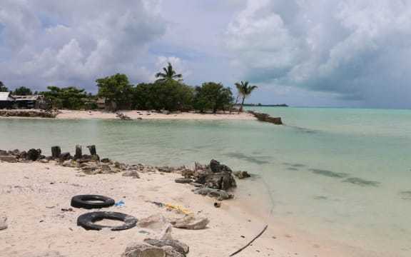 The seawall broke and created a channel. To the left where there was once houses, there is now a body of water